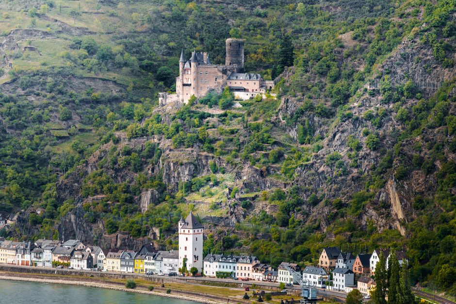 A panoramic view of the medieval Katz Castle and charming village along the Rhine River in Germany.